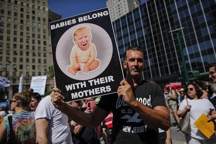   Thousands of people protest against separation policies of migrant families in the United States. With this sign that says: 